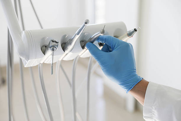 Professional Tooth Extraction technician working in Peachtree Corners, GA